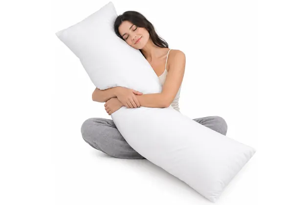 Woman hugging a long white full-length body pillow